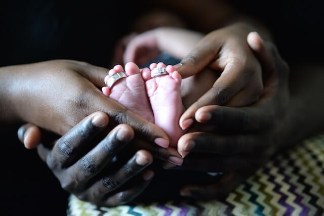 Baby feet with rings