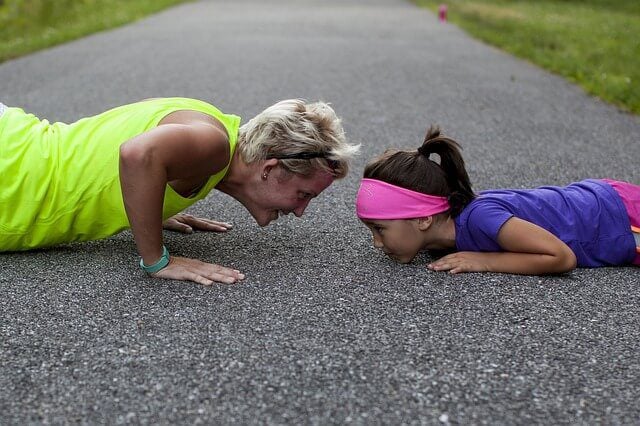 Push-ups woman and child