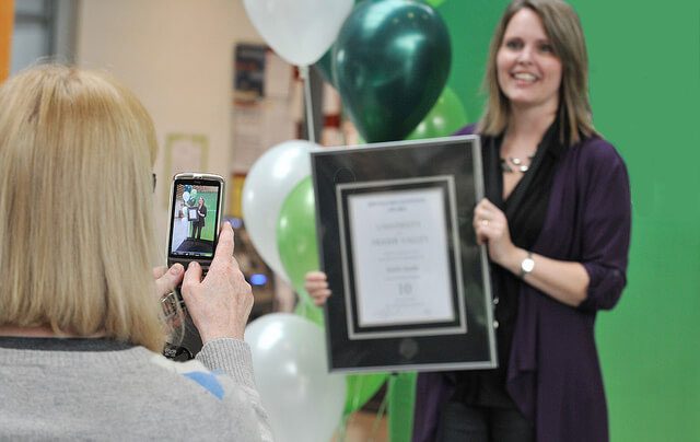 Woman with award