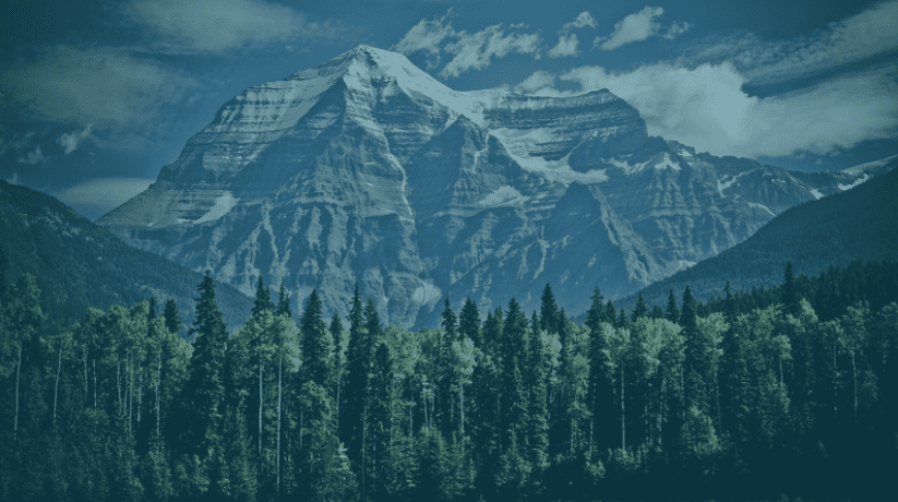 A website header image of mountains with a dark blue semi-transparent overlay, created with Canva.