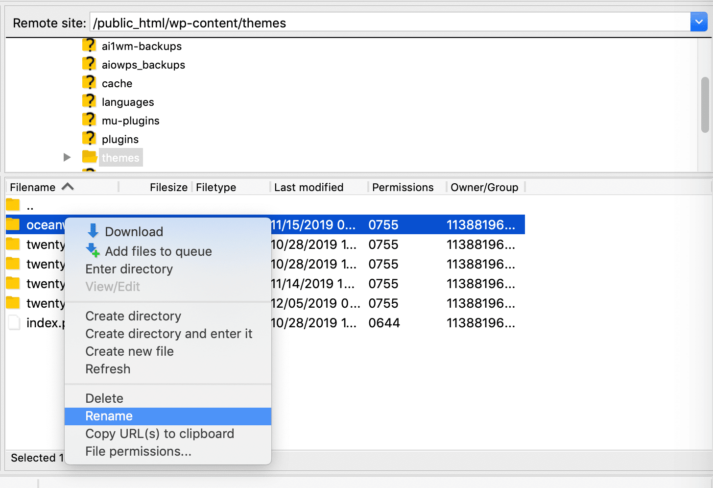 Deactivating a WordPress theme in FileZilla.