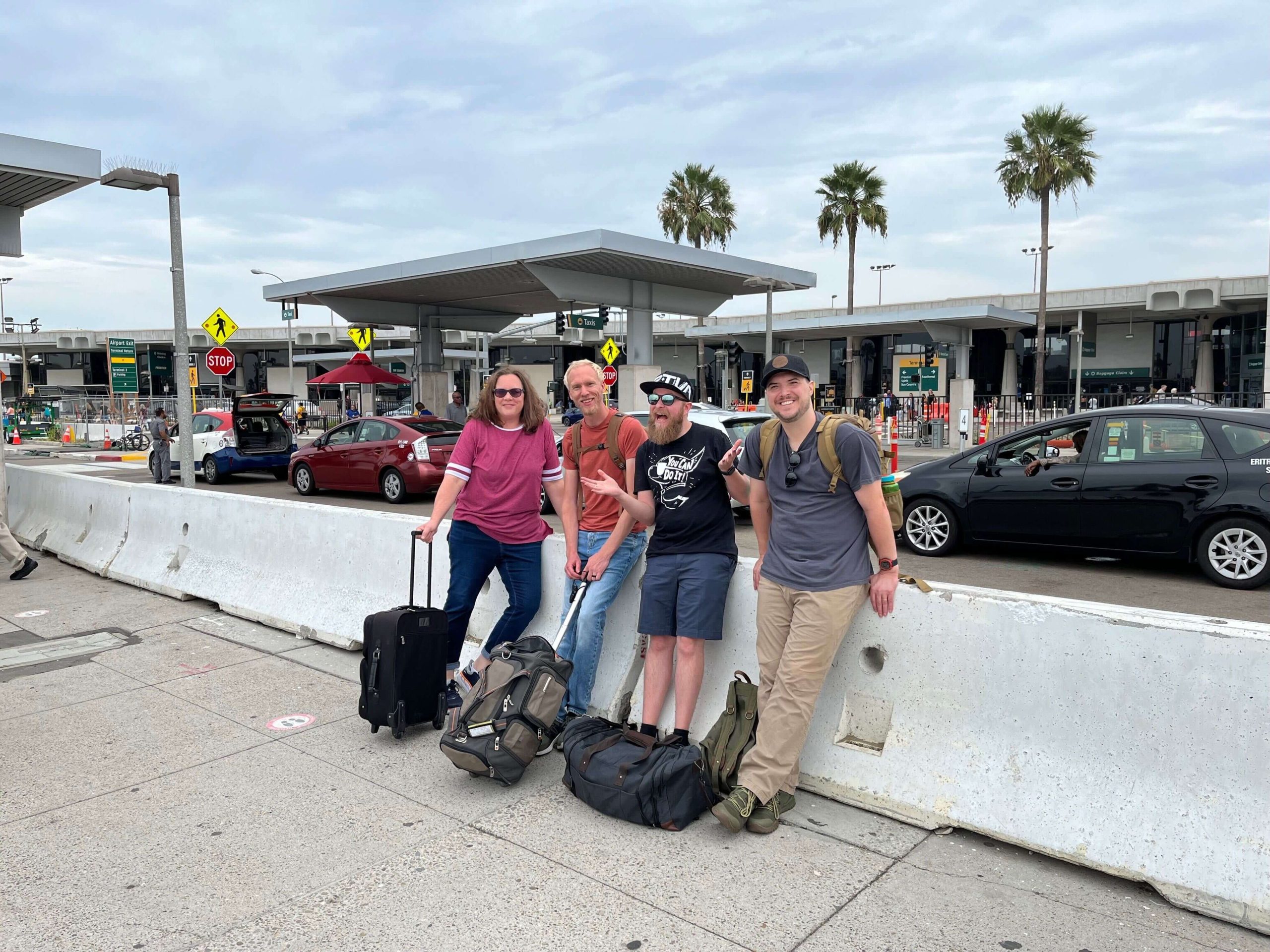 Four Elegant Themes employees meeting at the airport