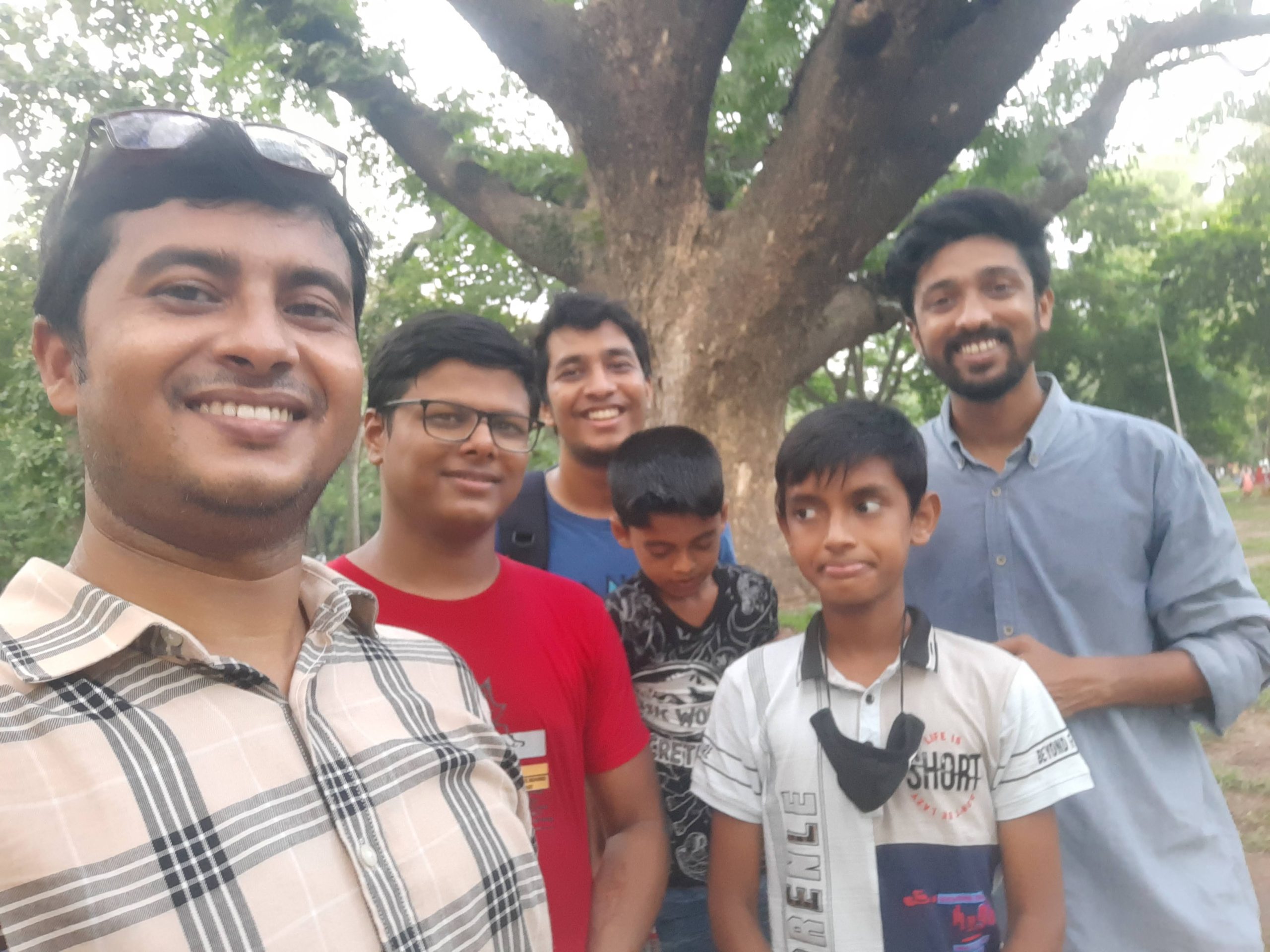 6 men & boys standing outside at the Divi Dhaka meetup