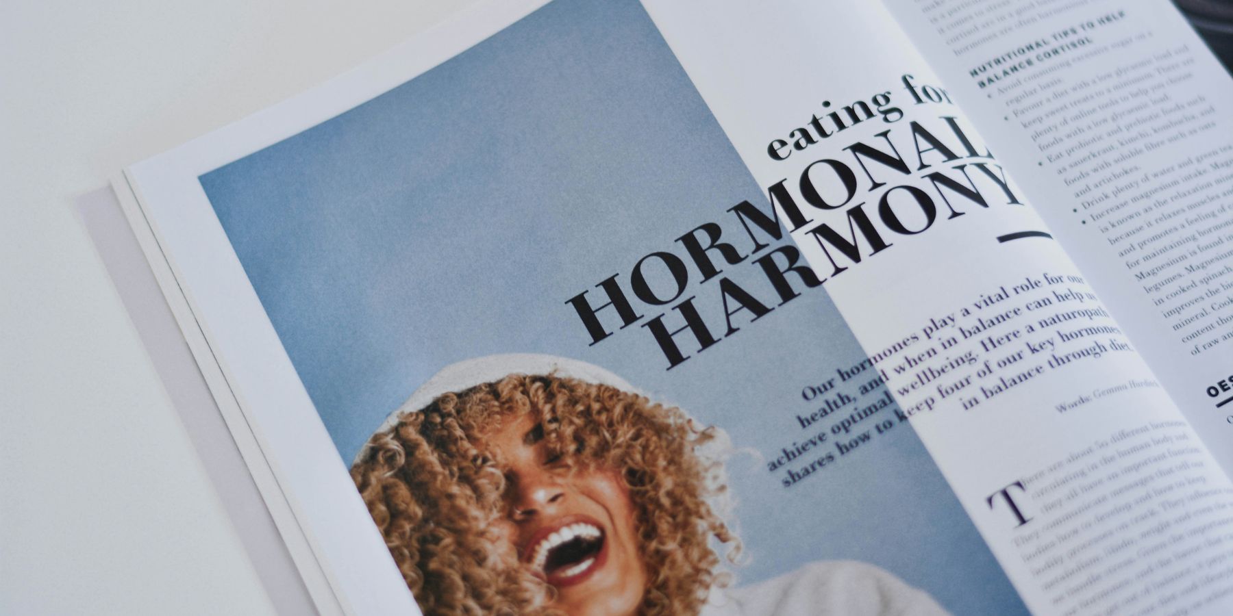 Magazine-style editorial layout with strong typography and structured text columns